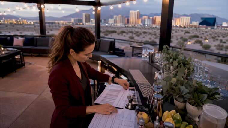 Wedding planner calculating alcohol quantities