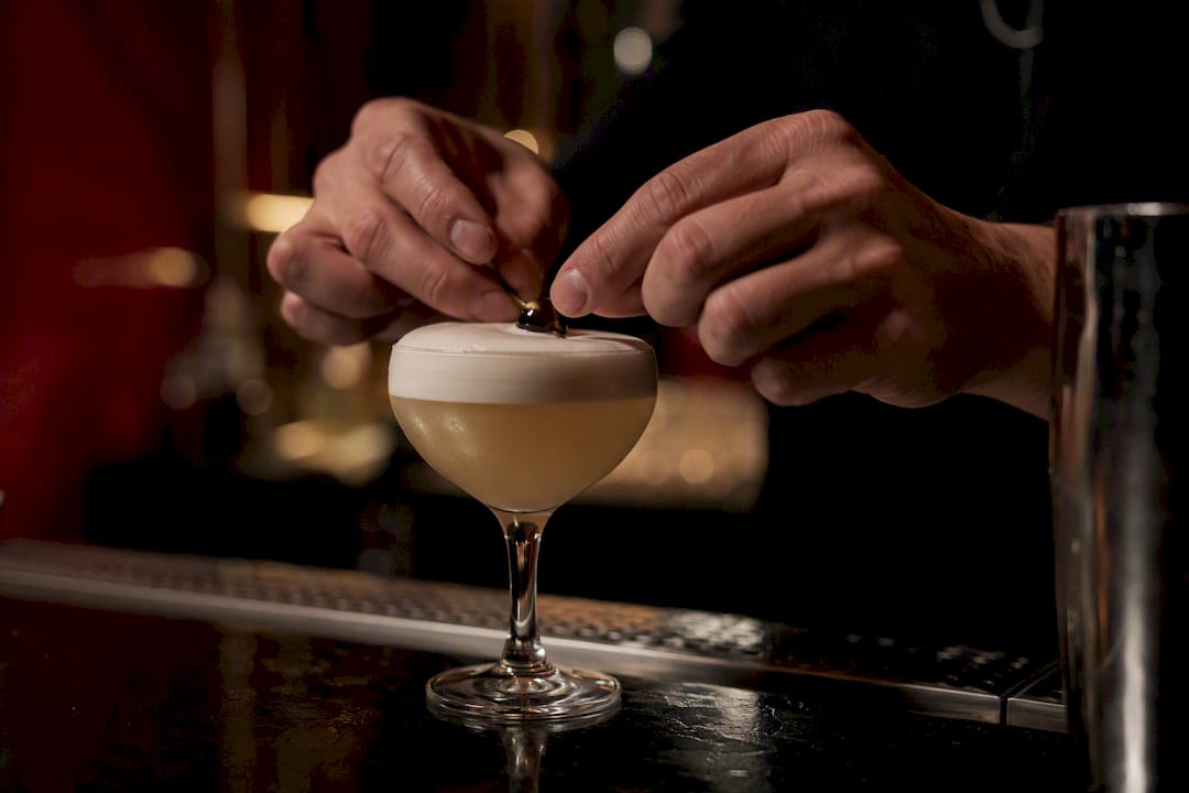 Aquafaba foam topping a cocktail
