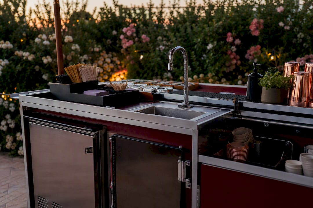 Close-up of eco-friendly mobile bar refrigeration and wash station