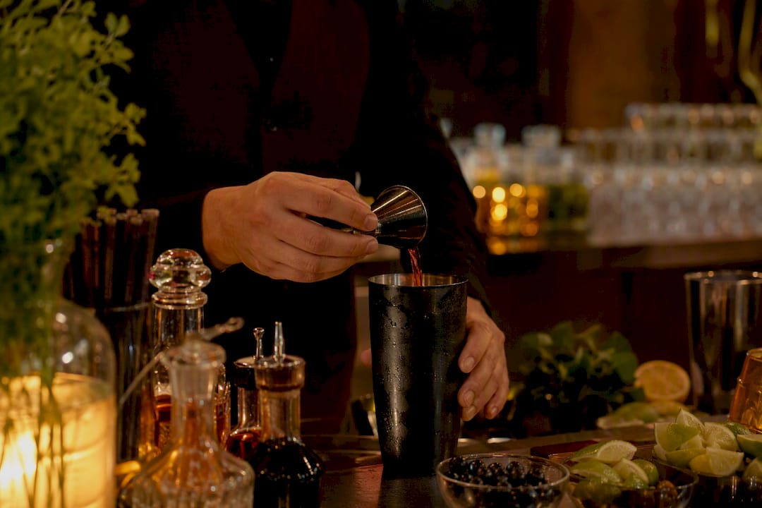 Bartender pre-batching cocktail ingredients