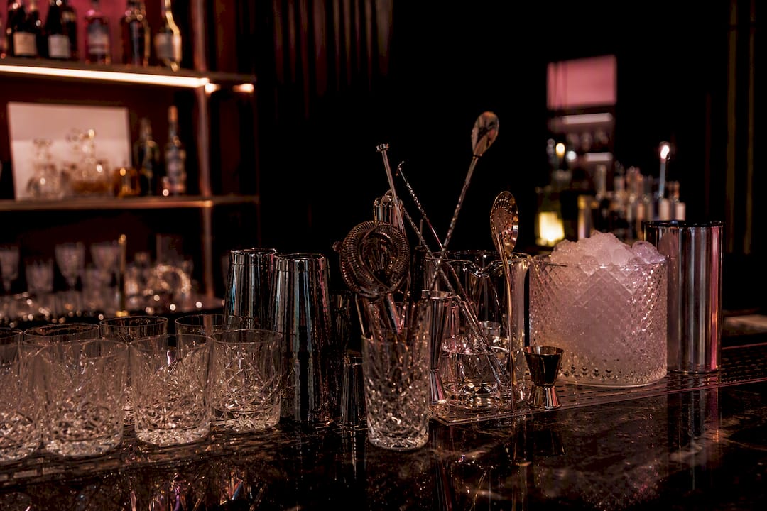 VIP bar setup with cocktail tools and glassware
