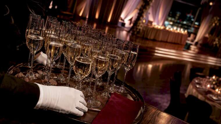 Champagne flutes staged for a wedding toast