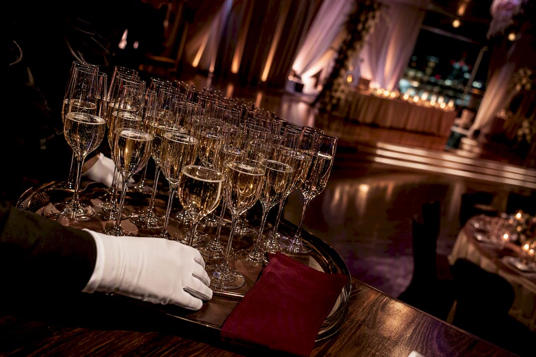 Champagne flutes staged for a wedding toast