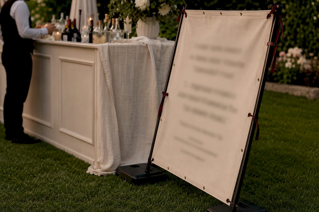 Outdoor sign secured against wind