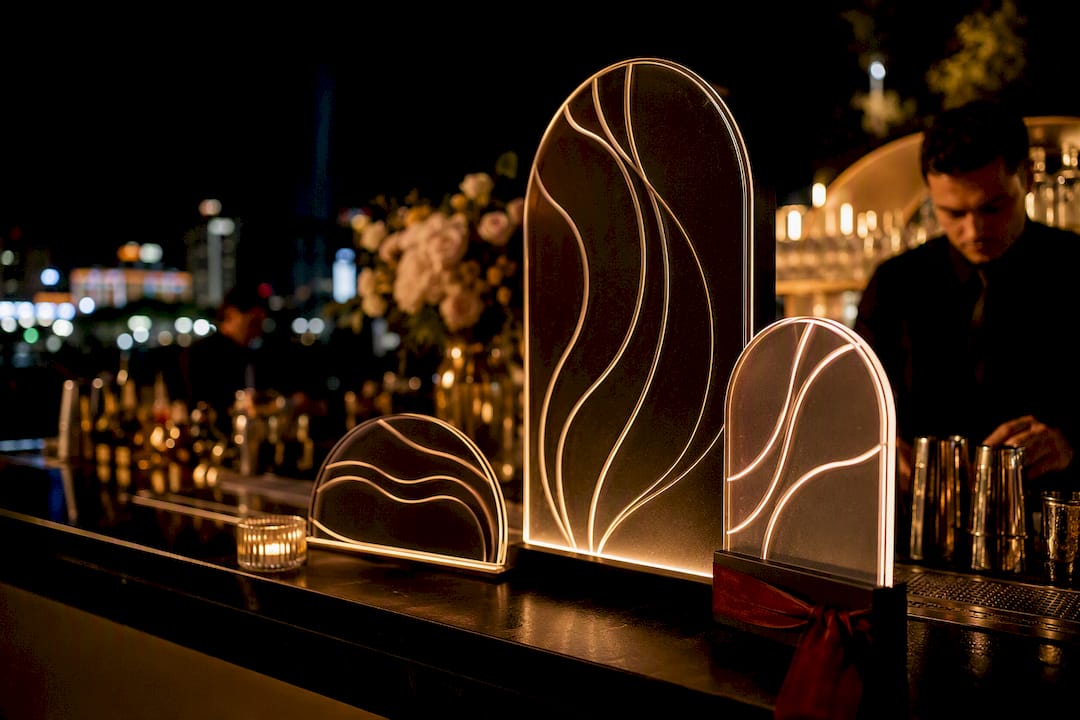 Elegant signage beside a wedding bar