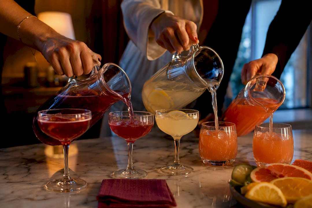 Batch cocktails poured for a party