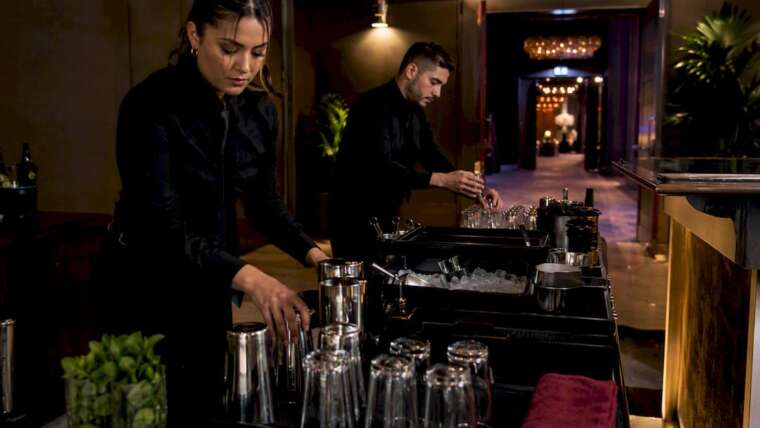 Bartenders preparing an event bar station