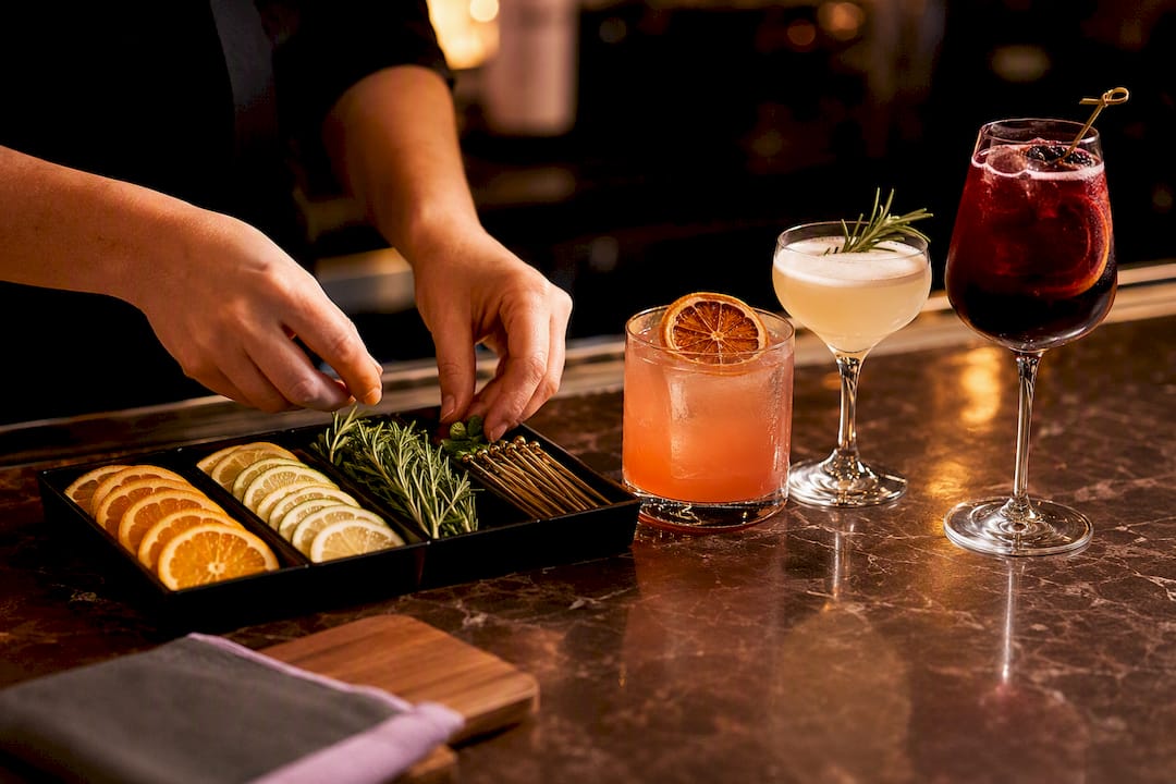 Signature cocktails with prepared garnishes
