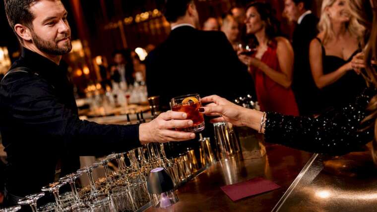 Bartender serving drinks at fundraiser event