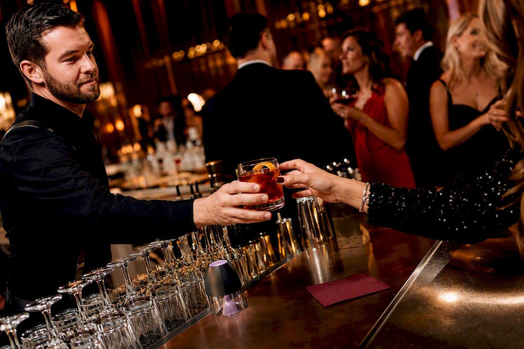 Bartender serving drinks at fundraiser event