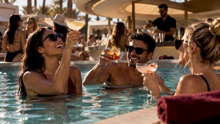 Guests enjoying cocktails at a Las Vegas pool