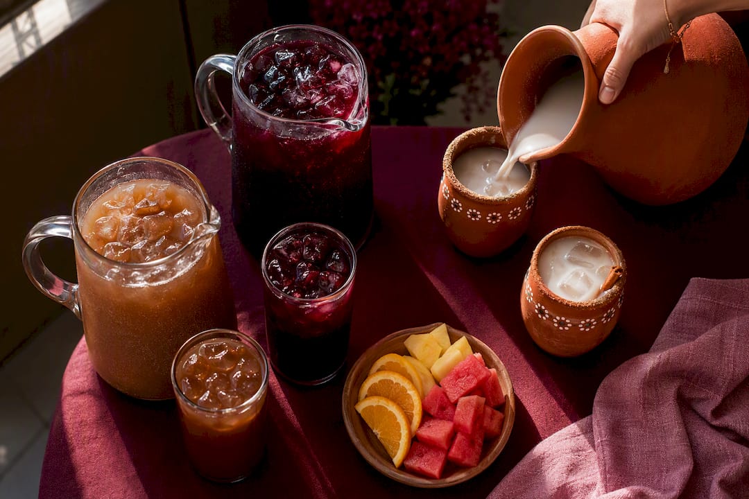 Horchata jamaica and tamarindo in traditional cups
